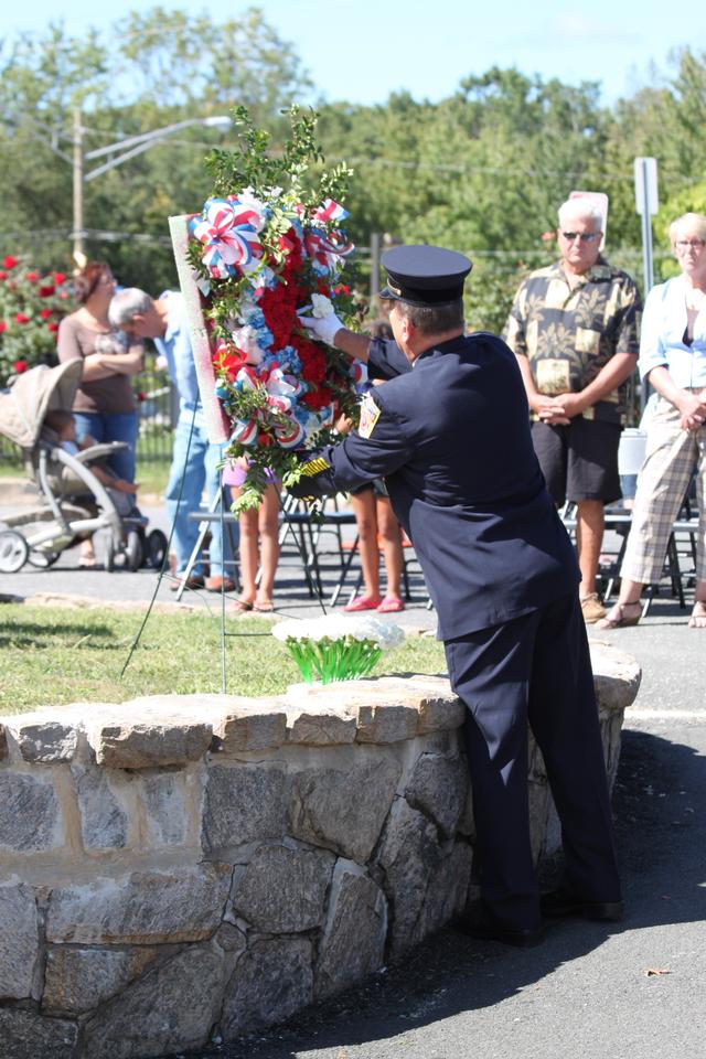 Flower placed for Peter Simpson by John Ficker.

Memorial Service NFD. September 9, 2012. Photo by Vincent P. Tuzzolino